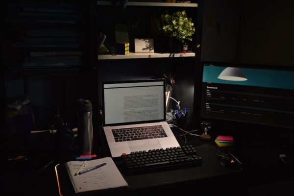a laptop sits on a desk