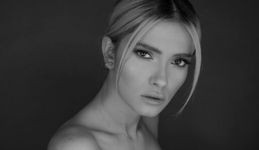 womans face in grayscale