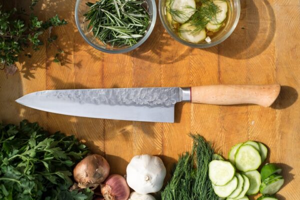 sliced vegetables and meat on chopping board
